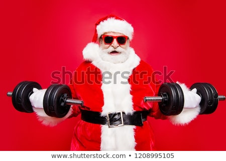 Stock fotó: Muscular Man Wearing A Santa Claus Clothes