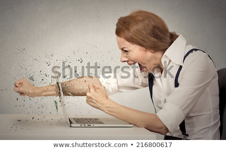 Foto stock: Angry Businesswoman Screaming At Computer