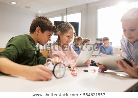 Stockfoto: Boys Or Students With Tablet Pc Computer School Lesson