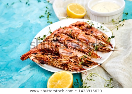 [[stock_photo]]: Grilled Big Tiger Shrimps Prawns On White Plate