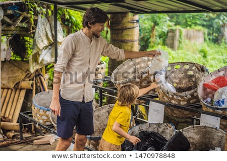[[stock_photo]]: Dad And Son Separate Garbage Collection Teaching Children To Separate Garbage Collection