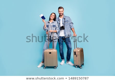 Stock photo: Happy Couple With Air Tickets Passport And Camera