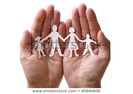 Foto d'archivio: Paper Chain Family Protected In Cupped Hands