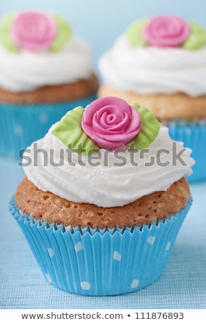 ストックフォト: Three Cupcakes With Marzipan Decoration