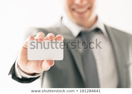 Zdjęcia stock: Business Man Holding A Blank Business Card Indoors At His Office