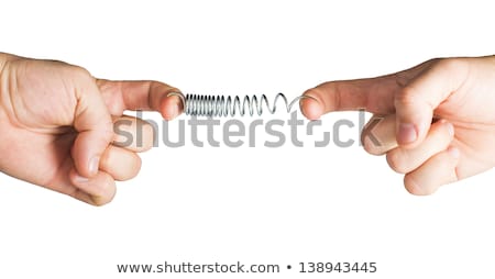 Foto stock: Stretched Spring Resistance And Opposition Metaphor