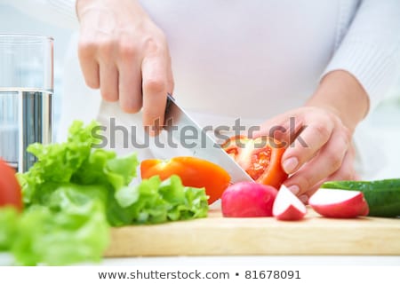 ストックフォト: Unrecognizable Woman Cooking At Home