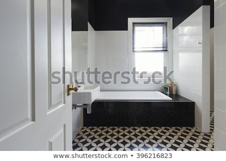 Stockfoto: Taps On Tiled Wall