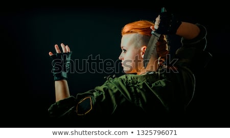 Foto stock: Warrior Woman With Combat Knife
