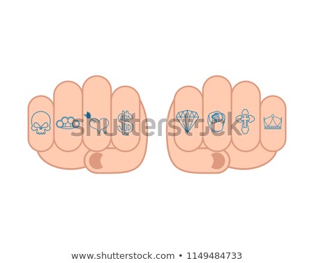 Сток-фото: Fist With Tattoos On Fingers Sign Brilliant And Rose Cross And
