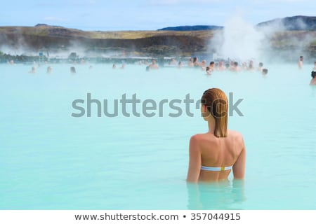 Stockfoto: Woman Enjoying Blue Lagoon