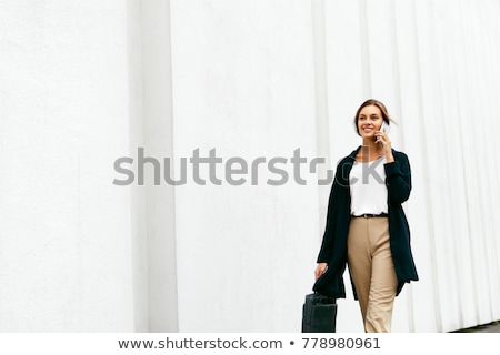 Сток-фото: Beautiful Business Woman Walking Outdoors Talking By Mobile Phone