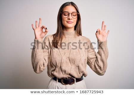 ストックフォト: Young Businesswoman Doing Yoga