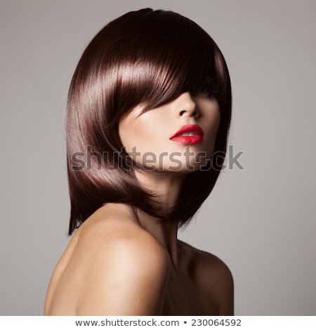 Foto d'archivio: Beauty Model With Perfect Glossy Brown Hair Close Up Portrait