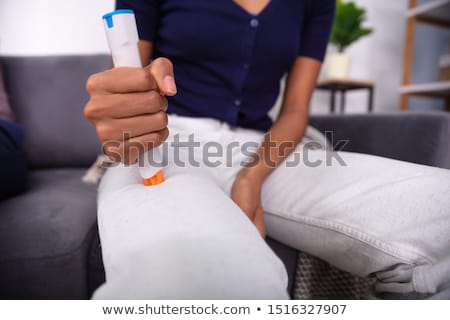 Zdjęcia stock: Woman Injecting Epinephrine Using Auto Injector Syringe
