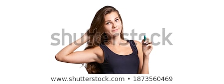 Stok fotoğraf: Portrait Of Young Teacher Pointing On White Marker Board In Mode