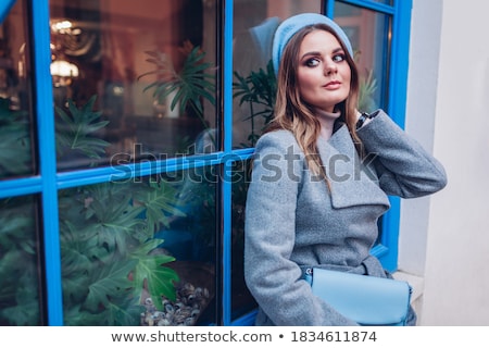 Stock fotó: Sitting Young Woman Wearing Extravagant Clothes