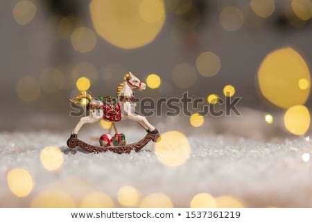 Stok fotoğraf: Vintage Toy Horse With Christmas Lights