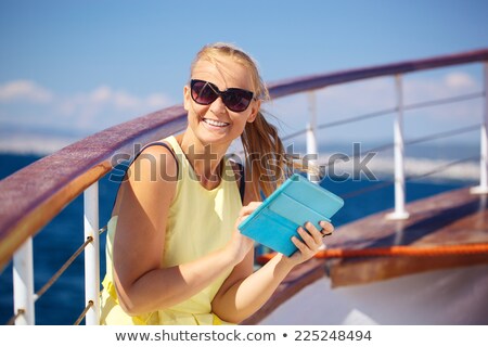 Foto stock: Woman At The Rail Of A Boat