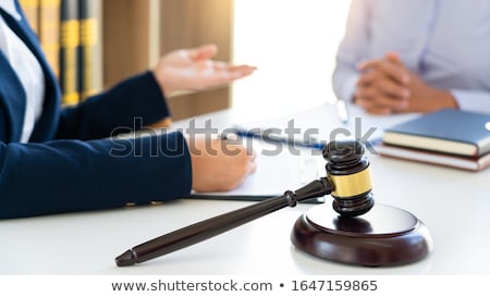 Stock photo: Female Lawyer Explaining Legal Situation And Discussing With Con