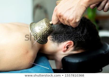 ストックフォト: Young Man In An Acupuncture And Sound Therapy