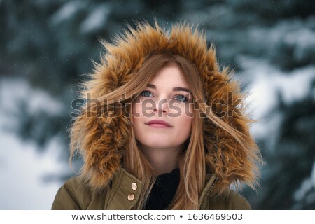 Foto stock: Blue Eyed Blonde Wearing With Hand On Hood