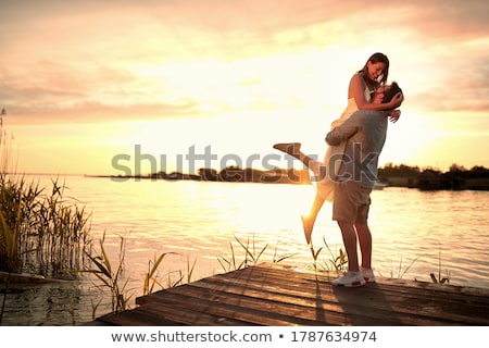 Stock fotó: Cheerful Romantic Couple Kissing