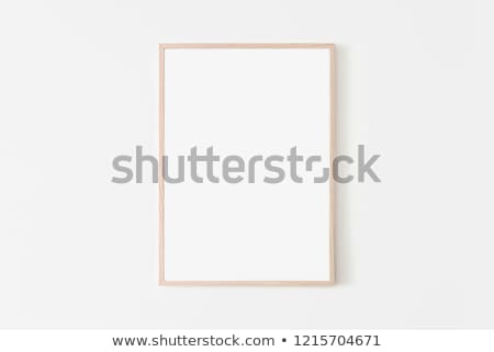 Stock photo: White Wall With Black Blank Frames