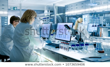 Stok fotoğraf: Woman Chemist Working In Hospital Clinic Lab