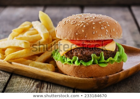 Stok fotoğraf: Burger With French Fries Cutlet With Cheese And Tomato