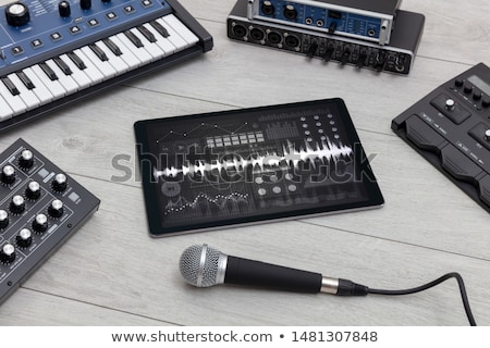 Stock fotó: Tablet And Electronic Music Instruments