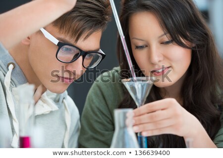 [[stock_photo]]: High School Students Couple Of Students Working At Chemistry Cl