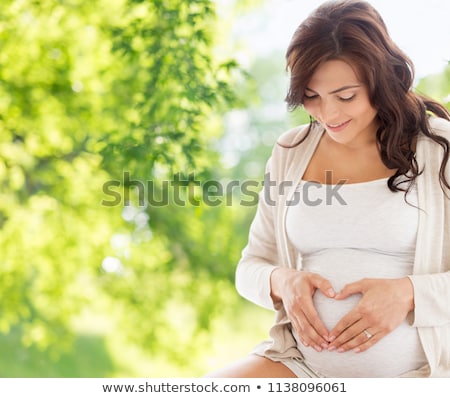 Stok fotoğraf: Belly Of A Hispanic Pregnant Woman