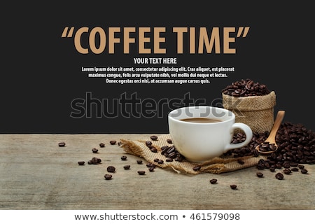 Сток-фото: Hot Fresh Coffee In A White Cup With Spoon On Wooden Table