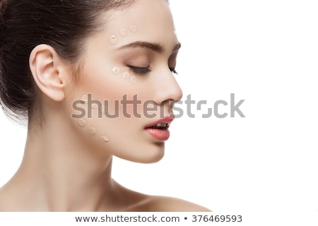 Stock foto: Girl With Foundation Cream On Face