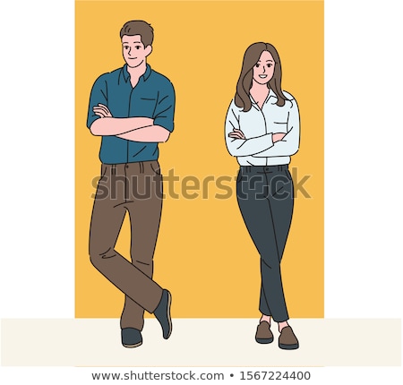 Stock photo: Man Standing With Arms Folded And Leaning On The Wall
