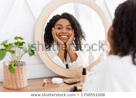 Stock fotó: Woman In Bathroom Applying Makeup