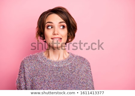 Foto stock: Close Up Portrait Of A Confused Young Woman