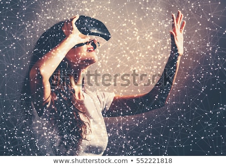 Stok fotoğraf: Girl Using The Virtual Reality Headset