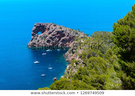 Foto stock: Deia Sa Foradada In Mediterranean Majorca