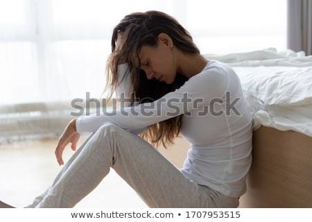 Foto stock: Worried Woman In The Bed