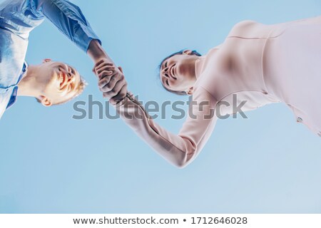 Foto stock: Overjoyed Businessman Jumping In The Sky