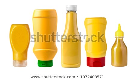 Foto d'archivio: Mustard Bottle On A White Background
