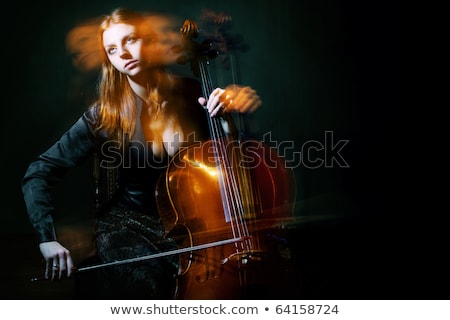 Stok fotoğraf: Female Musician Playing Violoncello