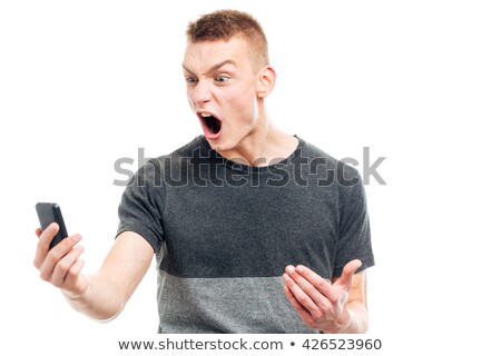 Stockfoto: Annoyed Angry Looking Young Man