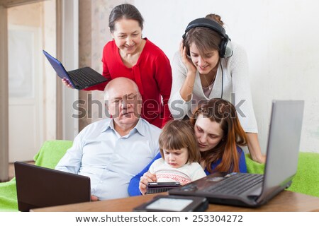 Zdjęcia stock: Father And Baby Daughter With Tablet Pc At Home