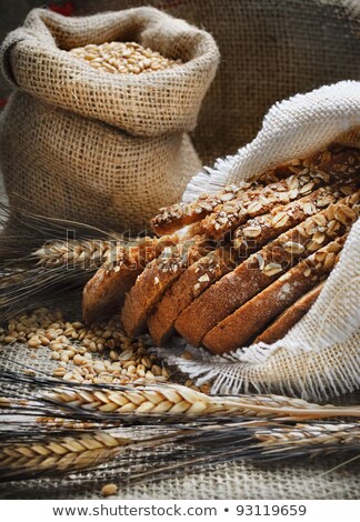 ストックフォト: Still Life With Baking Rye Bread Ears Flour And Bag Of Grains