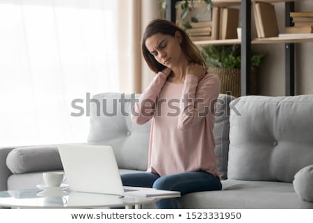 Foto stock: Unhappy Woman Suffering From Backache At Home