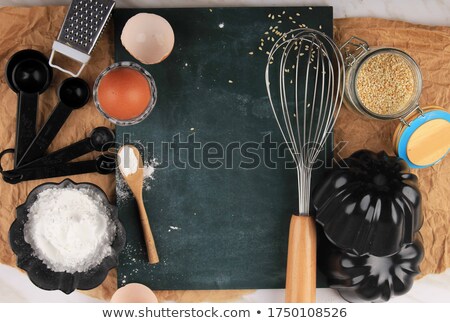 Сток-фото: Flour Scoop Eggs And Whisk On Black Marble