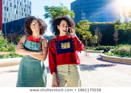 Woman Holding Arms Crossed While Her Lover Is Holding Her Stockfoto © 2Design